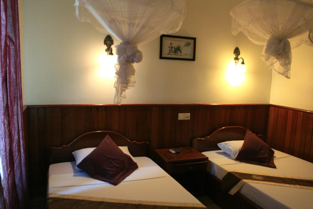 Firefly Guesthouse - The Berlin Angkor Siem Reap Rum bild