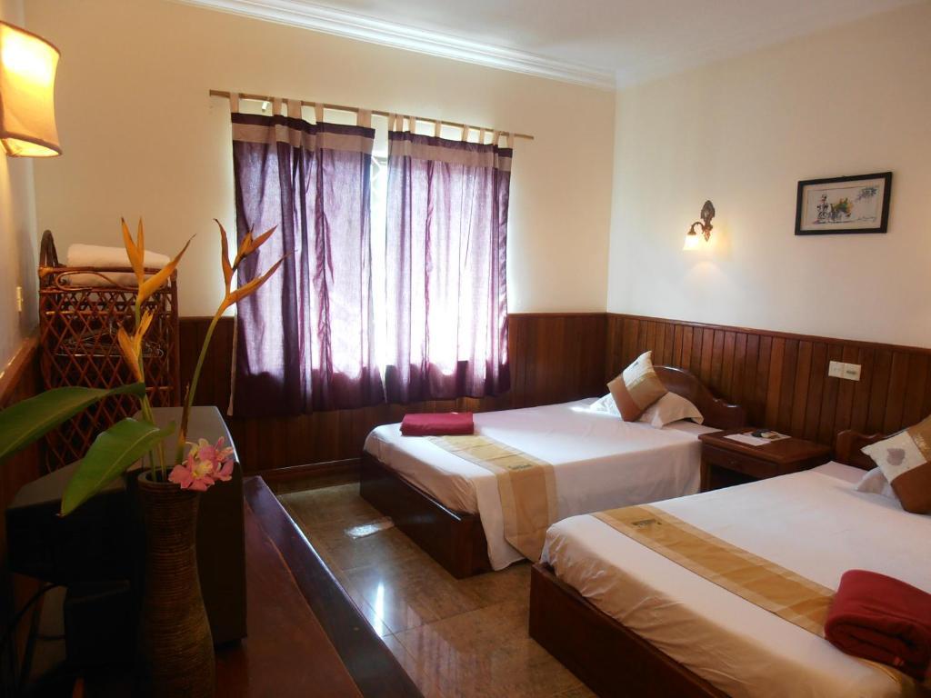 Firefly Guesthouse - The Berlin Angkor Siem Reap Rum bild