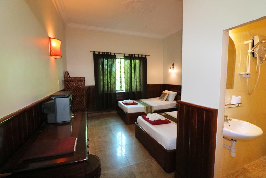 Firefly Guesthouse - The Berlin Angkor Siem Reap Rum bild